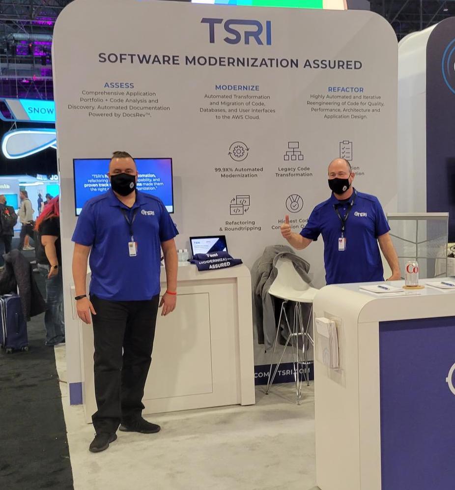 René Wagner, left, and Scott Pickett at the TSRI booth